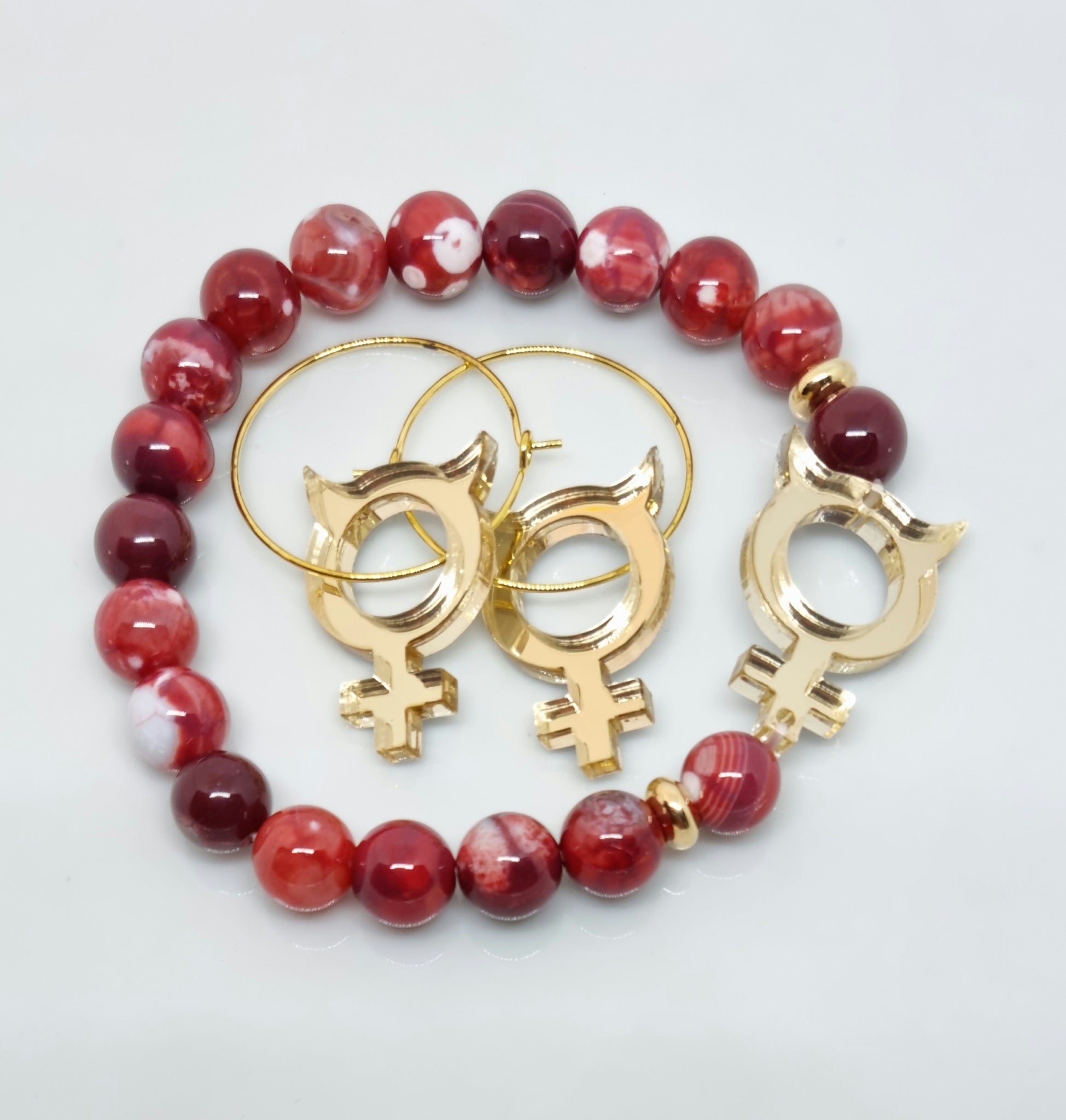 Rödmelerad Agat och honjävel i guld